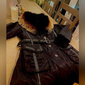 Danier mid length winter coat with detachable real fur collar, leather trim.